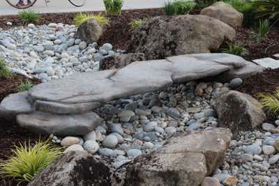 Rock bridges make a great functional addition to dry creek beds. These are designed with steel frames to ensure years of durability. 