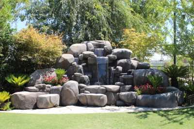Fresno Dante Club waterfall created and installed by Stoneage Evolution. This waterfall has become the main focus point for many of the events held at the club. 